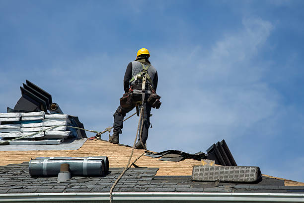 Professional Roofing technician working in West Harrison, NY